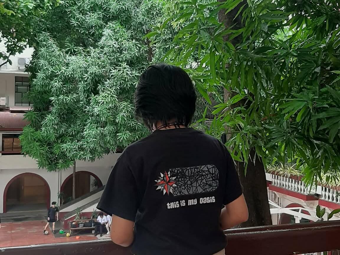 As freshman student at Philippine Women’s University looks out toward the campus for the first time.