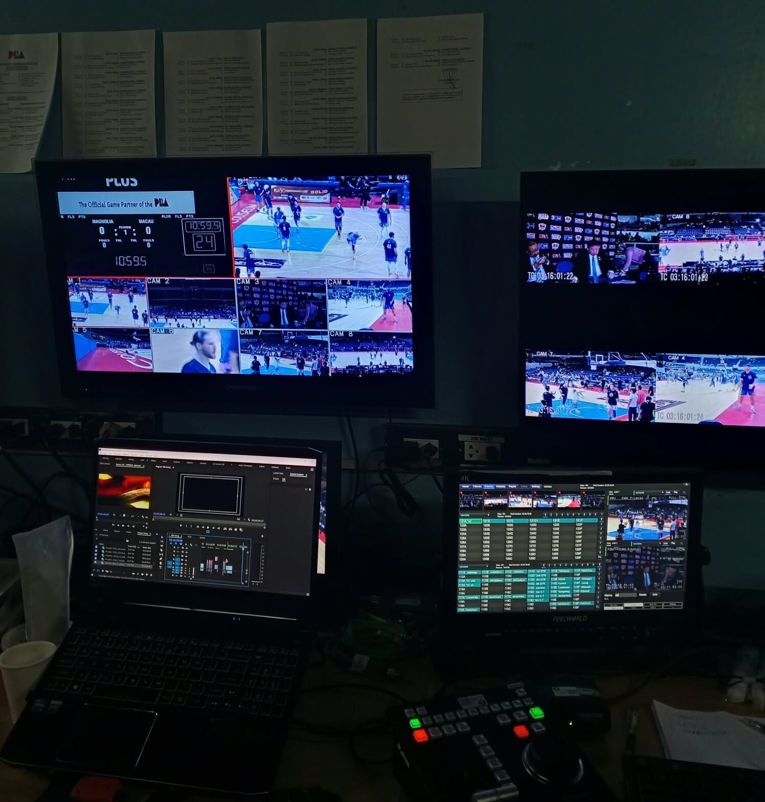 A production monitor showing the live PBA broadcast during a behind-the-scenes production setup.