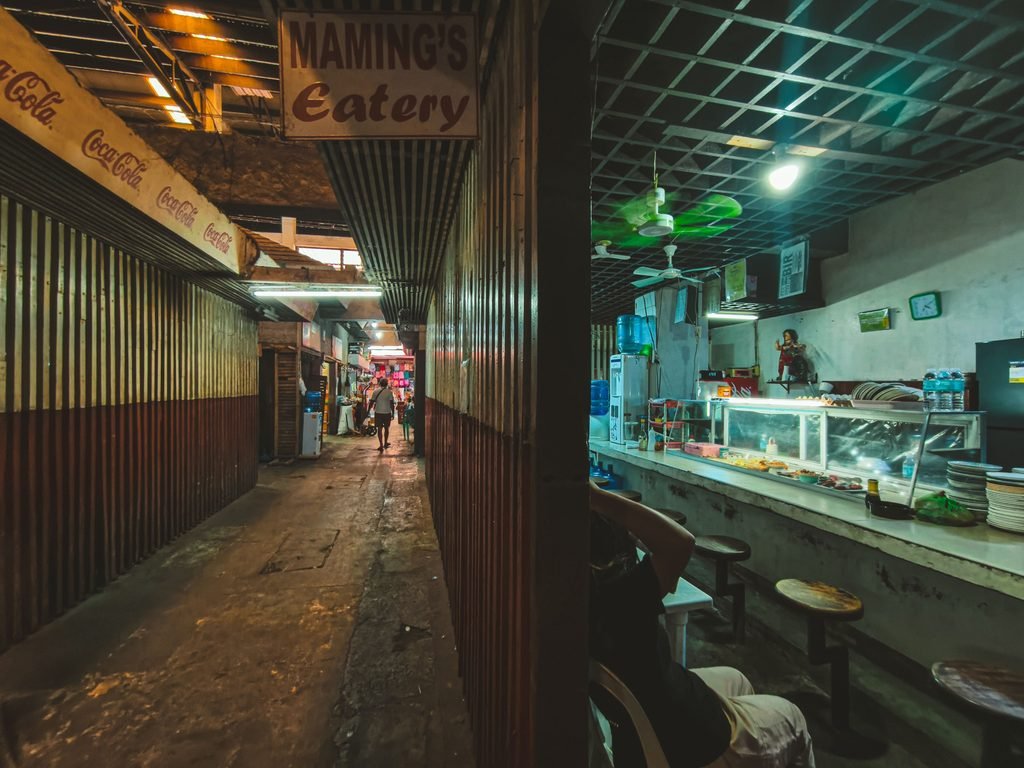 A variety of Filipino dishes served at a local karinderya.